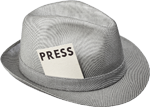 A gray fedora hat with a white press card tucked into the hatband, signifying a traditional journalist or reporter's accessory.